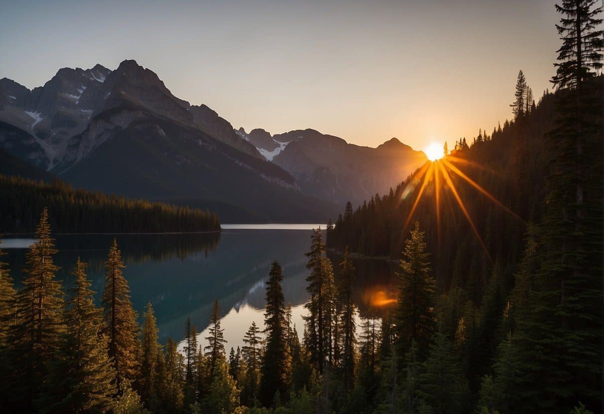 The sun sets behind the rugged peaks of Hozomeen Campground, casting a warm glow over the tranquil lake and surrounding forests